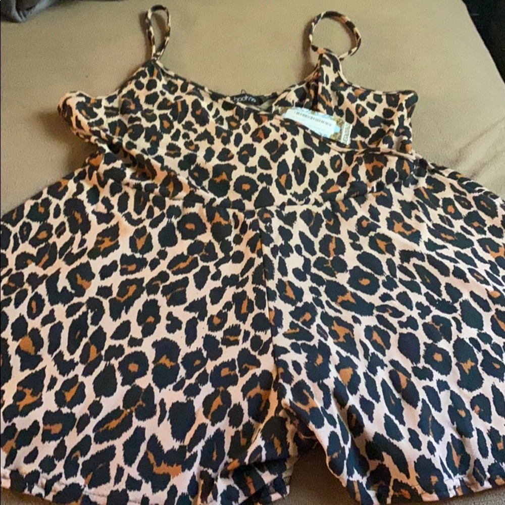 Leopard print romper. Never worn, tag attached